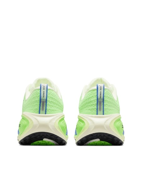 Nike Vomero Plus verde hombre vista trasera con tirador azul