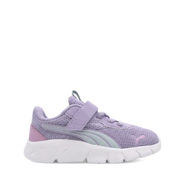 Zapatillas deportivas niña Puma lila con velcro y cordón elástico.