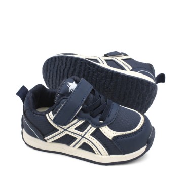 Zapatillas deportivas niño azul marino vista lateral
