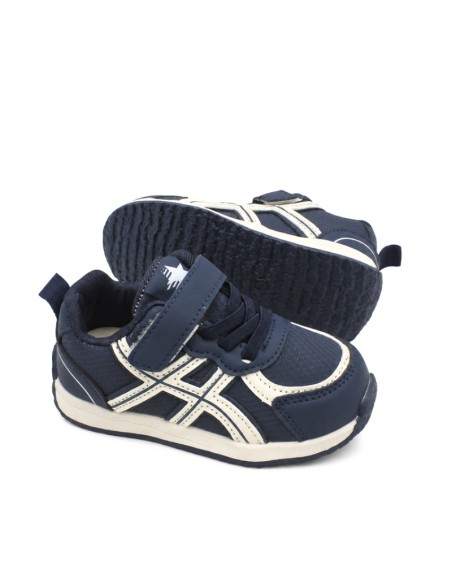 Zapatillas deportivas niño azul marino vista lateral