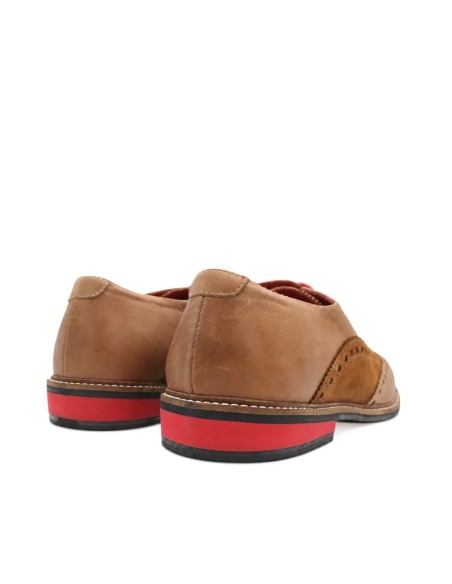 zapatos brogue para hombre con detalle rojo en el talón