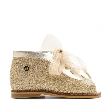 zapato abotinado de glitter dorado para niña