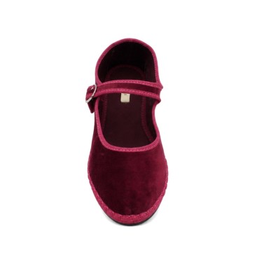 Vista superior de mercedita fucsia de terciopelo