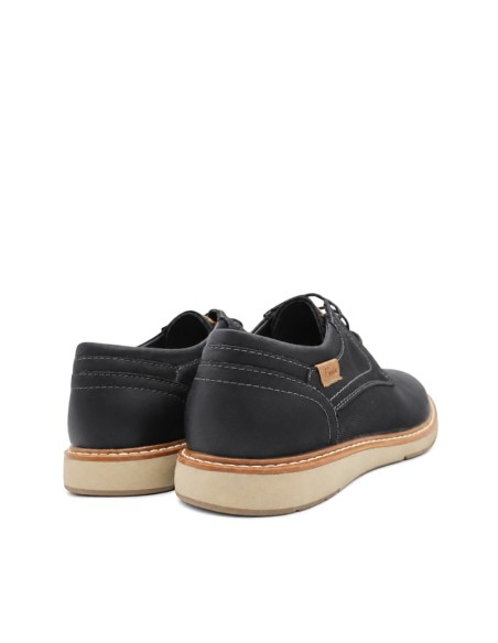 Vista trasera de zapato blucher negro con suela beige