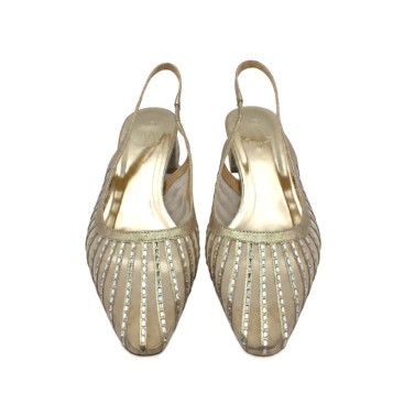 Vista frontal de zapato destalonado dorado para mujer