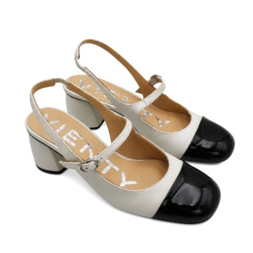 Zapato blanco destalonado Vienty con puntera negra de charol