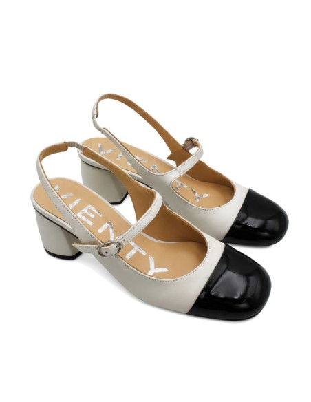 Zapato blanco destalonado Vienty con puntera negra de charol
