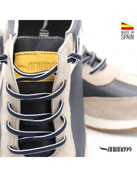 ZAPATILLAS DE PIEL PARA HOMBRE